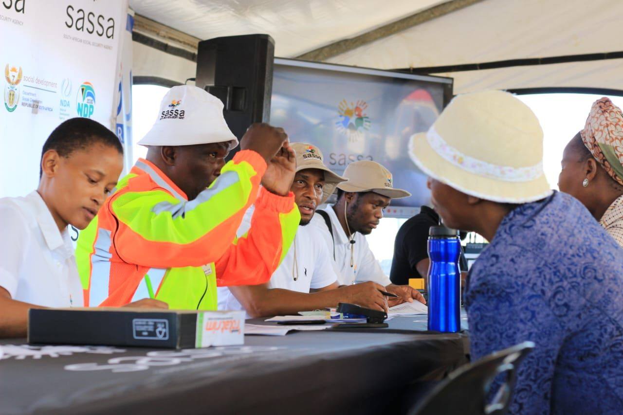 Opening of New Jobs at SASSA Offices for Unemployed, SASSA team working at mobile verification unit helping grant beneficiaries